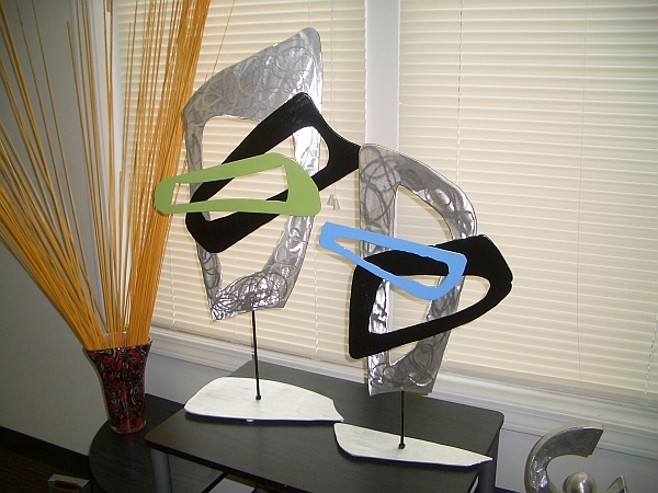 tabletop sculptures with a abstract 70's style and a retro sculpture