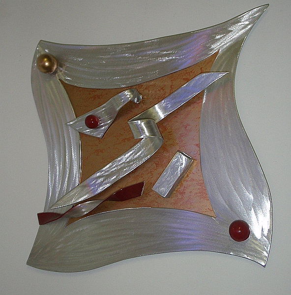 wall sculpture in brushed aluminum