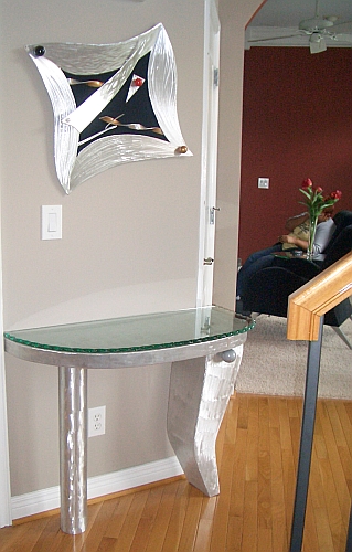 modern foyer table in brushed aluminum 