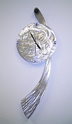 modern swoosh design clock for modern clock lovers