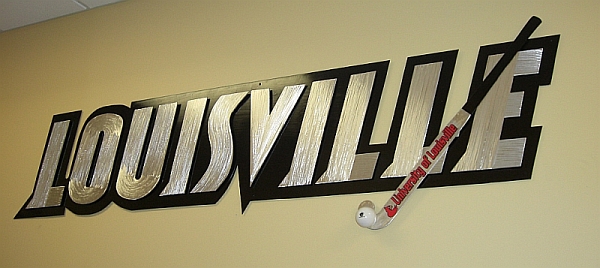 Uof L sign and university of louisville cards head logo.
