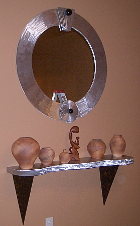 contemporay mirror in brushed aluminum mirror