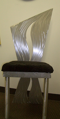 ding chair in abstract chair design in brushed aluminum 