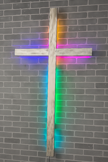 "Illuminated Christian cross with LED halo effect"  "Color-changing LED church cross on white background"